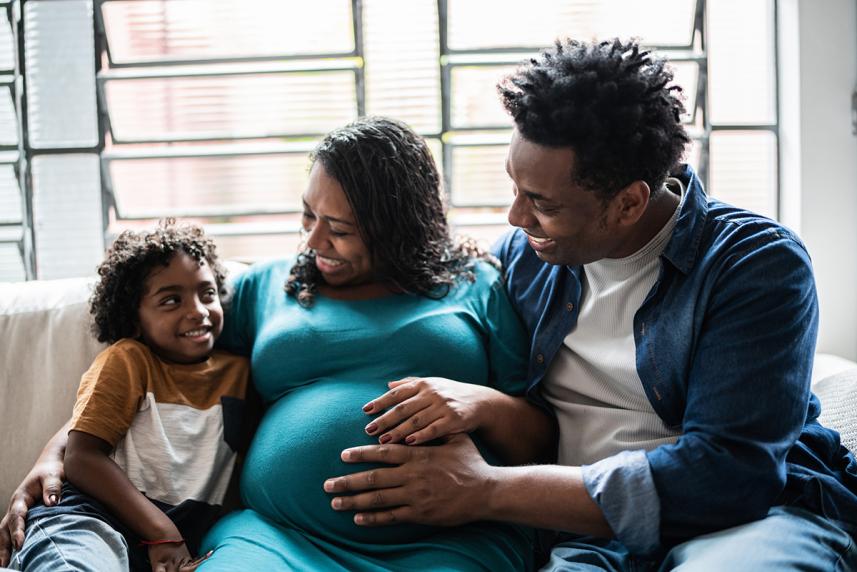 Family sitting on a couch