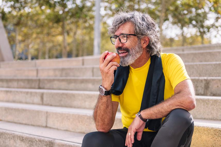 Man eating an apple