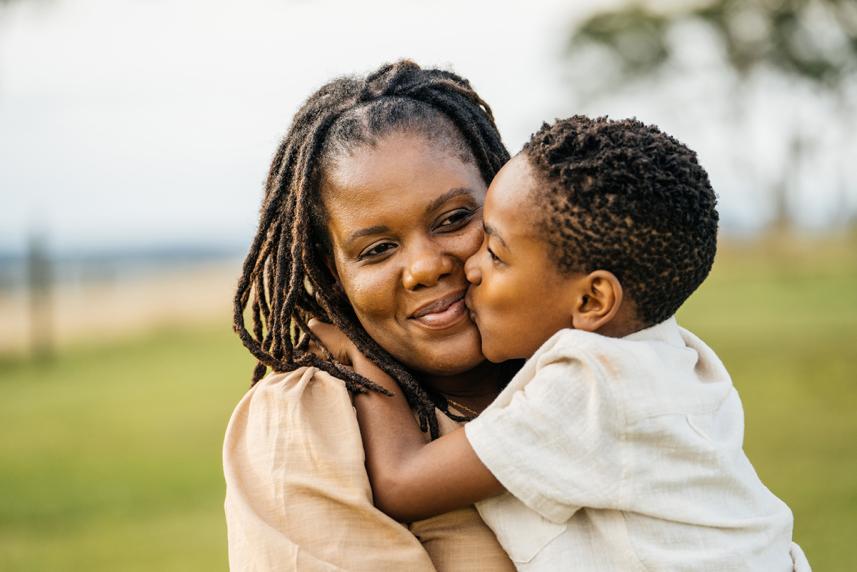 Mother and son hugging