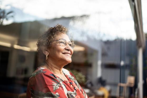 Woman looking out a window
